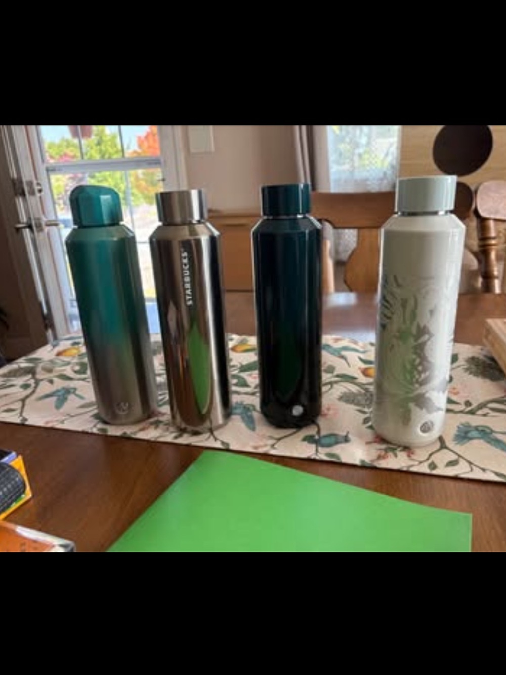 Four Starbucks Water Bottles